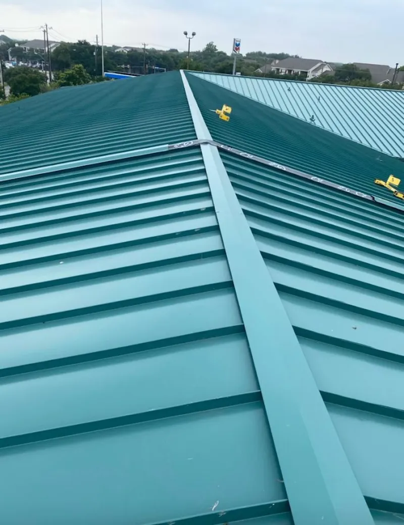 Green commercial metal roof ridge and valley for Metal Roof Repair in Oakdale